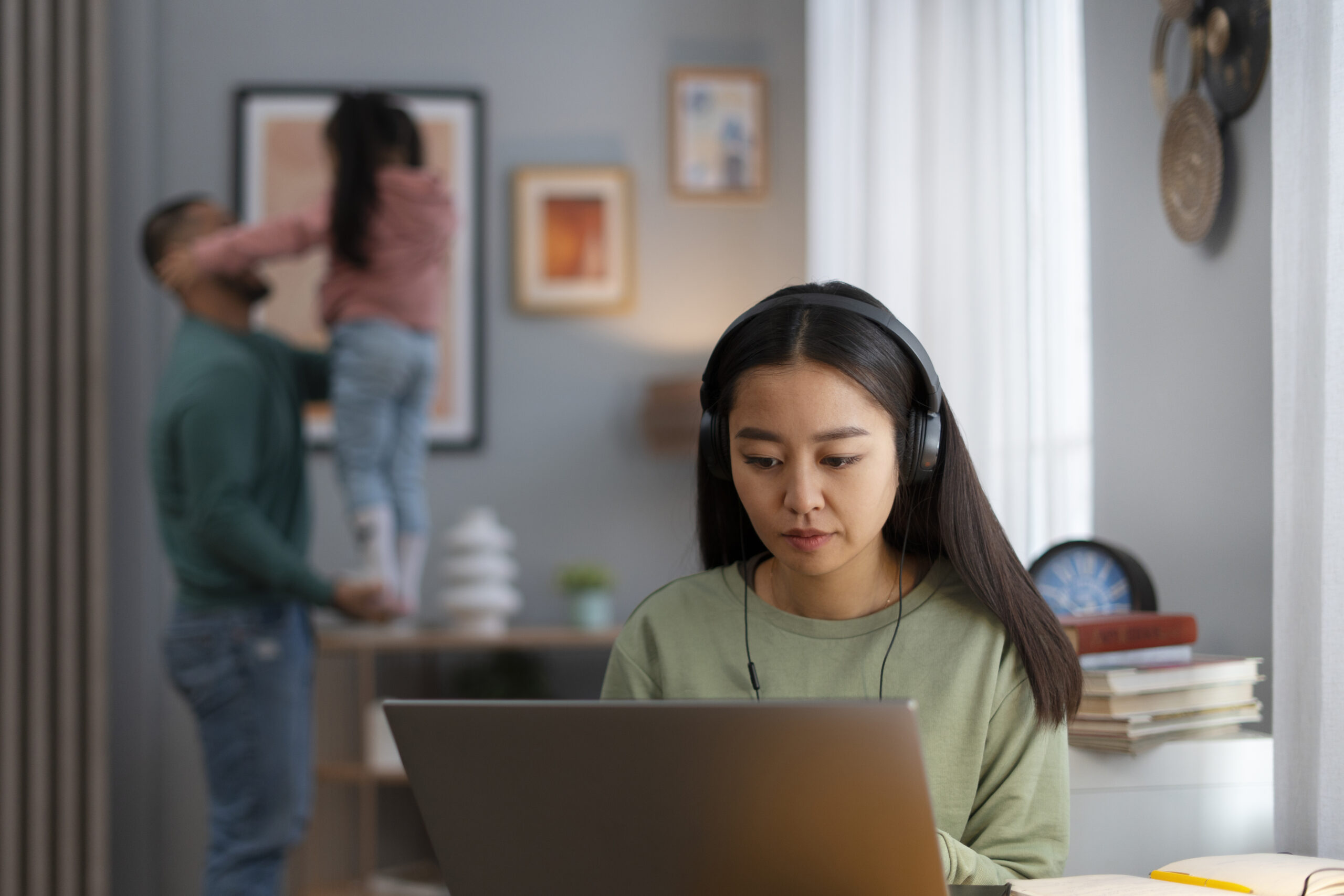 parent working remotely with children home scaled